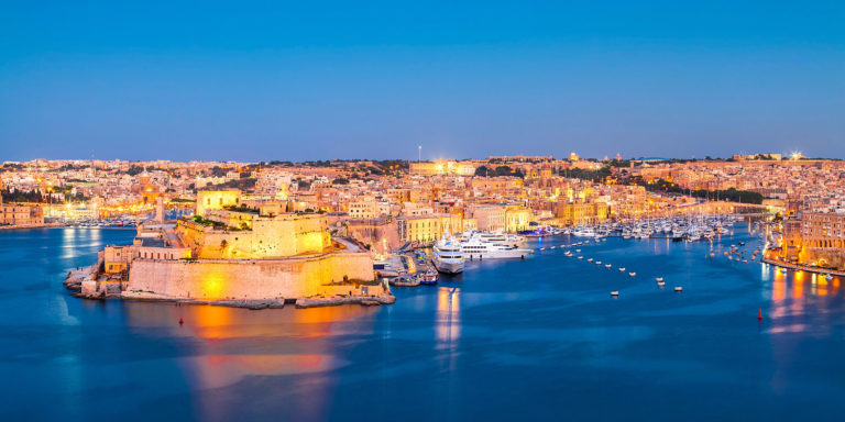 Valletta, Malta - Evening View from Upper Barrakka Gardens across the Grand Harbour towards Senglea and Cospicua