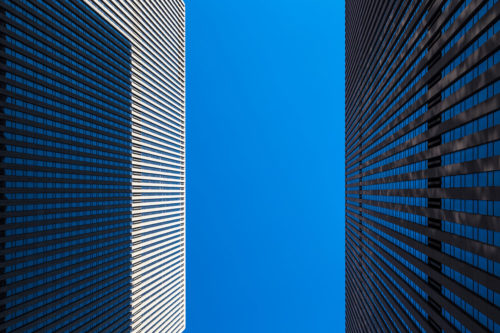 New York City - Upward View of Two Skyscrapers in Manhattan