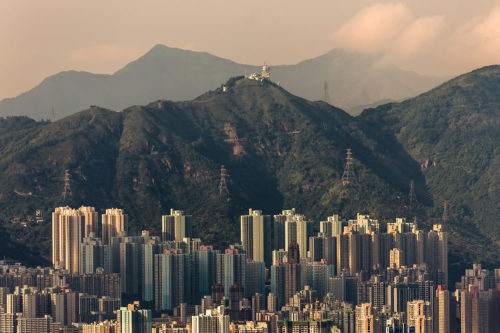 Highrise Apartment Buildings in Kowloon, Hong Kong and the Neighbouring Mountains as Seen from Victoria Peak