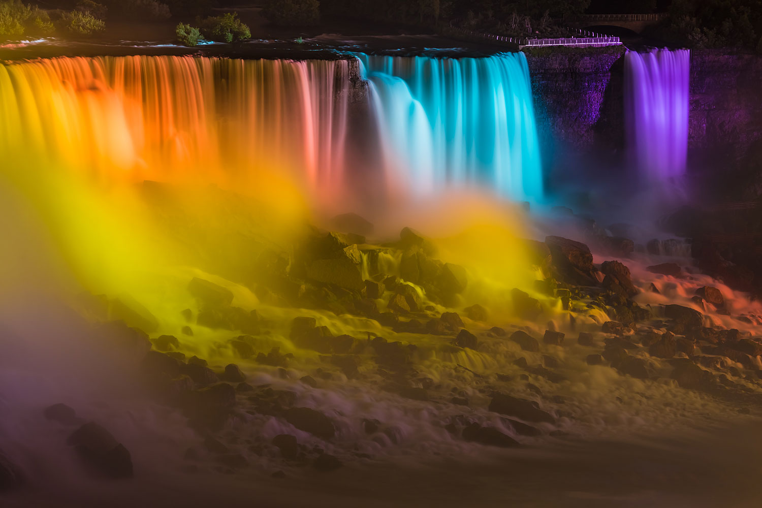 Niagara Falls - Illuminated American Falls and Bridal Veil Falls as Seen from the Canadian Side in the Evening