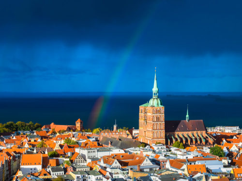 Stralsund, Germany - Rainfall Approaches The Sunlit Old Town of Stralsund, Western Pomerania